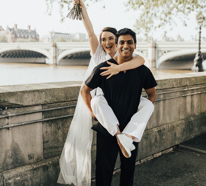 NHS Dr Annalan Navaratnam and Nurse Jann Tipping marry in the chapel of Guys and St Thomas Hospital in London amid Coronavirus pandemic by Rebecca Carpenter