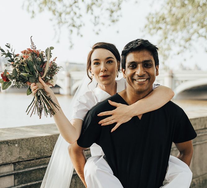 NHS Dr Annalan Navaratnam and Nurse Jann Tipping marry in the chapel of Guys and St Thomas Hospital in London amid Coronavirus pandemic by Rebecca Carpenter