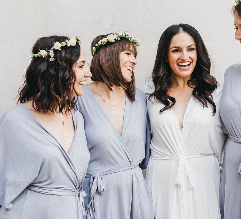 Wedding Morning Preparations at The Ned | Bride in White Getting Ready Robe | Bridesmaids in Blue Getting Ready Robes | Stunning Syon Park Wedding with Quill Stationery Suite | Nancy Ebert Photography