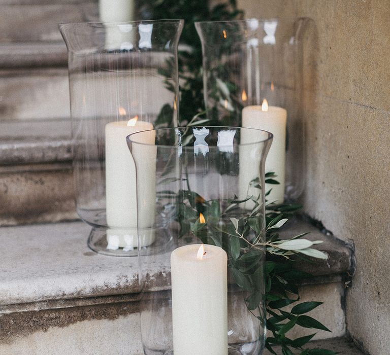 Step Decor at Syon Park | Hurricance Vases and Pillar Candles | Eucalyptus | Stunning Syon Park Wedding with Quill Stationery Suite | Nancy Ebert Photography