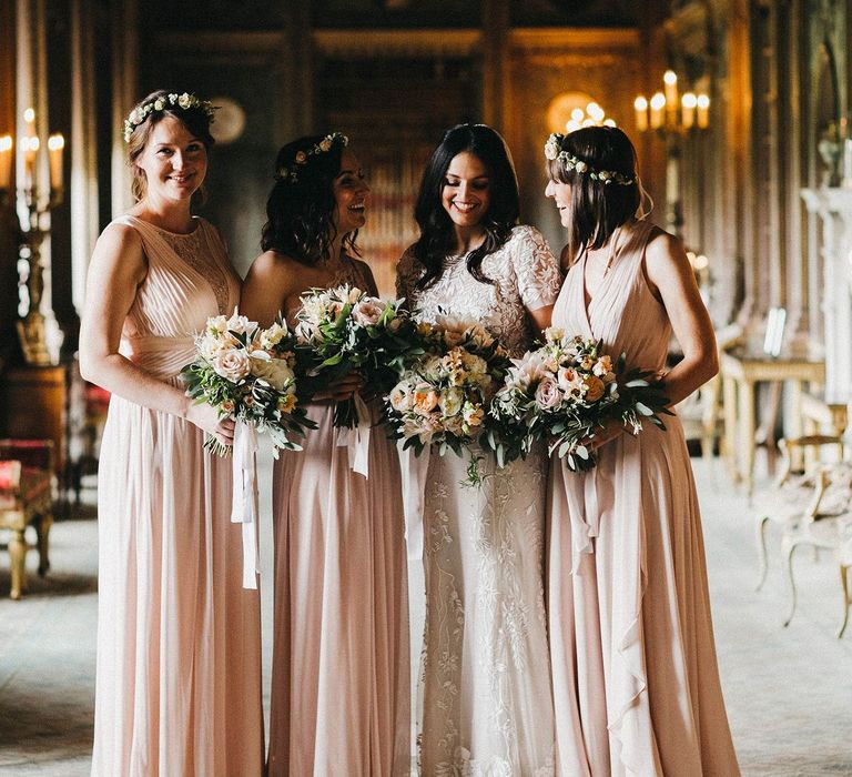 Bride in Hermione de Paula Wedding Gown with Short Sleeves and Personalised Embroidery | Cathedral Veil | Bridesmaids in Blush Pink Dresses by Adrianna Papell | Bridesmaid in Blush Pink Jenny Packham for Debenhams Dress | Flower Crowns | Blush, Cream and Pink Bouquets | Stunning Syon Park Wedding with Quill Stationery Suite | Nancy Ebert Photography