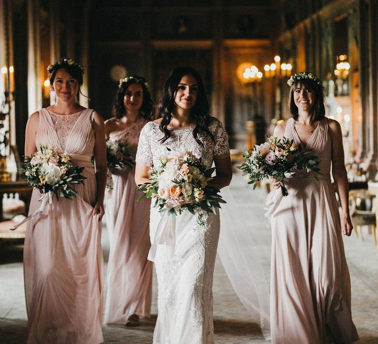 Bride in Hermione de Paula Wedding Gown with Short Sleeves and Personalised Embroidery | Cathedral Veil | Bridesmaids in Blush Pink Dresses by Adrianna Papell | Bridesmaid in Blush Pink Jenny Packham for Debenhams Dress | Flower Crowns | Blush, Cream and Pink Bouquets | Stunning Syon Park Wedding with Quill Stationery Suite | Nancy Ebert Photography