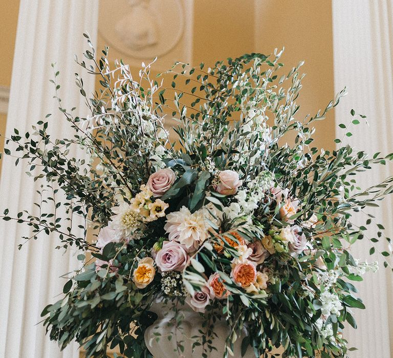 Ceremony Decor at Syon Park | Huge Urn of Cafe au Lait Dahlias, David Austin Roses, Hydrangeas, Delphinium, Cosmos, Eucalyptus and Olive | Stunning Syon Park Wedding with Quill Stationery Suite | Nancy Ebert Photography