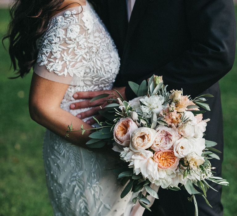 Bride in Hermione de Paula Wedding Gown with Short Sleeves and Personalised Embroidery | Groom in Navy Lanvin Tuxedo and Black Burberry Shoes | Burgundy Bow Tie | Blush, Cream and Pink Bridal Bouquet | Stunning Syon Park Wedding with Quill Stationery Suite | Nancy Ebert Photography