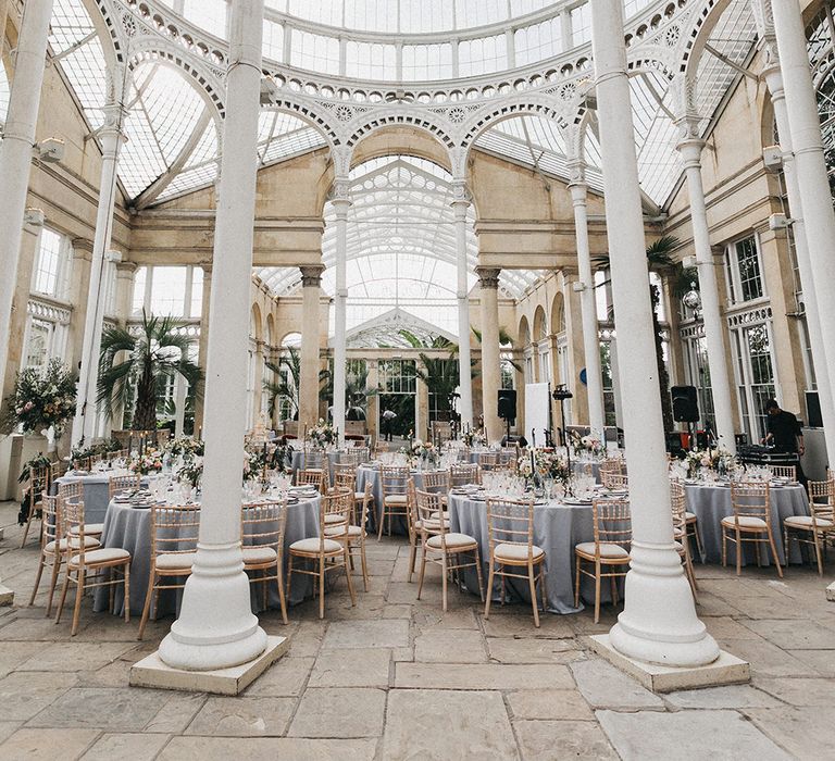 Wedding Reception Decor | Blush, Cream and Pink Floral Centrepieces | Grey Tablecloths | Grey Tapered Candles | Gold Cutlery | Pink Goblets | Stunning Syon Park Wedding with Quill Stationery Suite | Nancy Ebert Photography