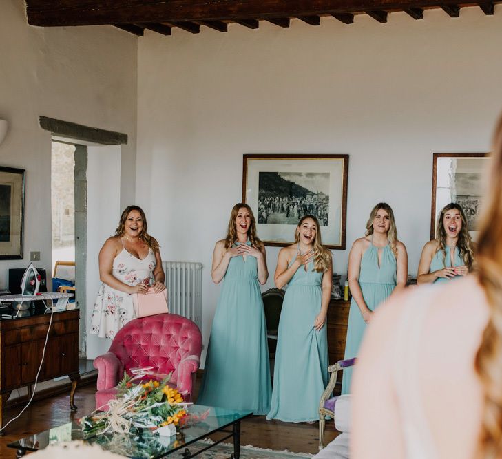 Bridesmaid dresses in mint green during bridal preparations