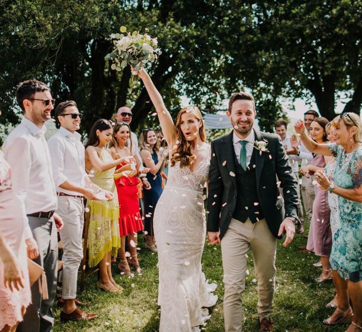 Confetti exit for bride and groom at destination wedding