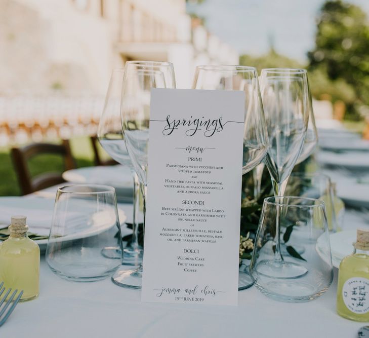 Wedding table decor with foliage to match bridesmaid dresses in mint green