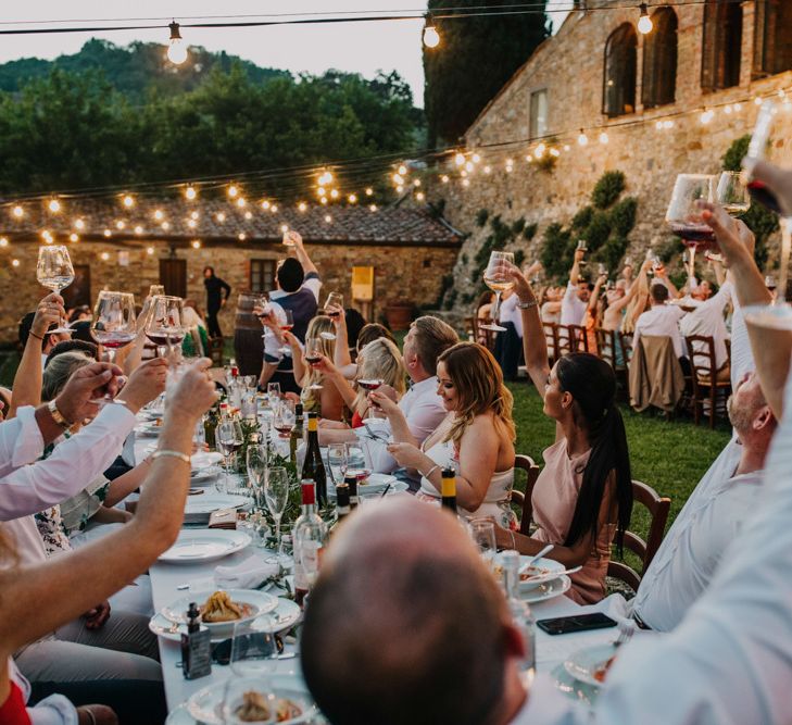 Guests raise a toast to the happy couple