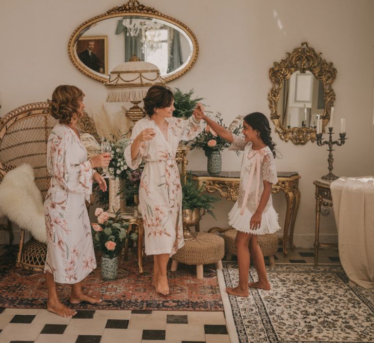 Wedding Morning Bridal Preparations with Bridesmaids in Floral Getting Ready Robes