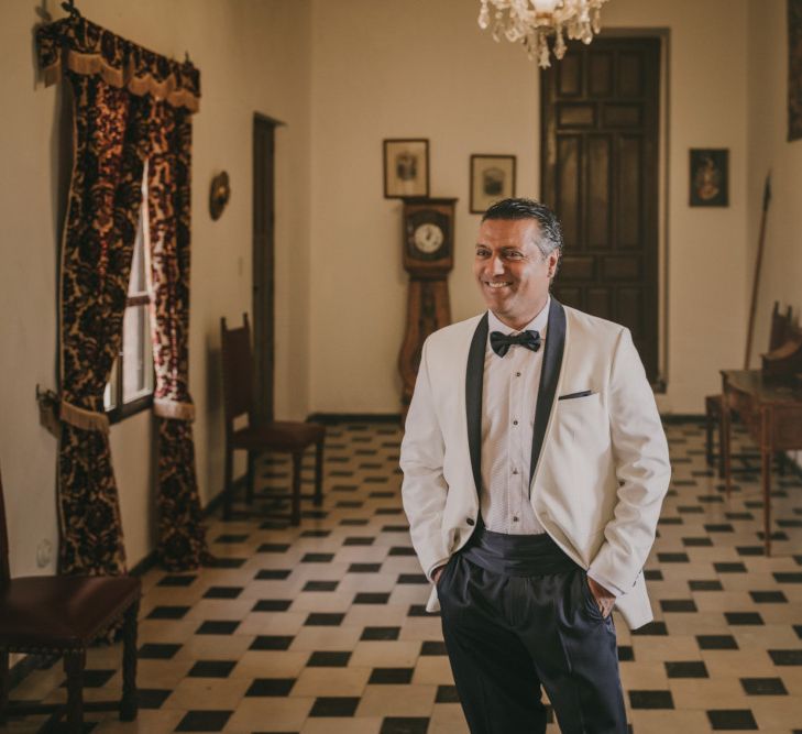 Groom in White Dinner Jacket on the Wedding Morning