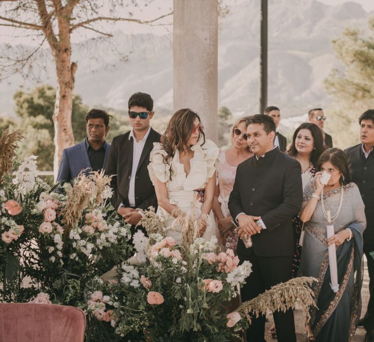 Wedding Guests During the Outdoor Wedding Ceremony