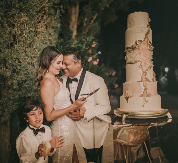 Bride and Groom cutting the Geode Wedding Cake