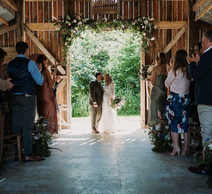 Bride and Groom During Rustic  Ceremony