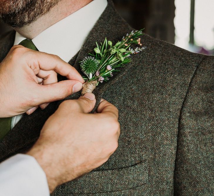 Groom Fitting His Buttonhole