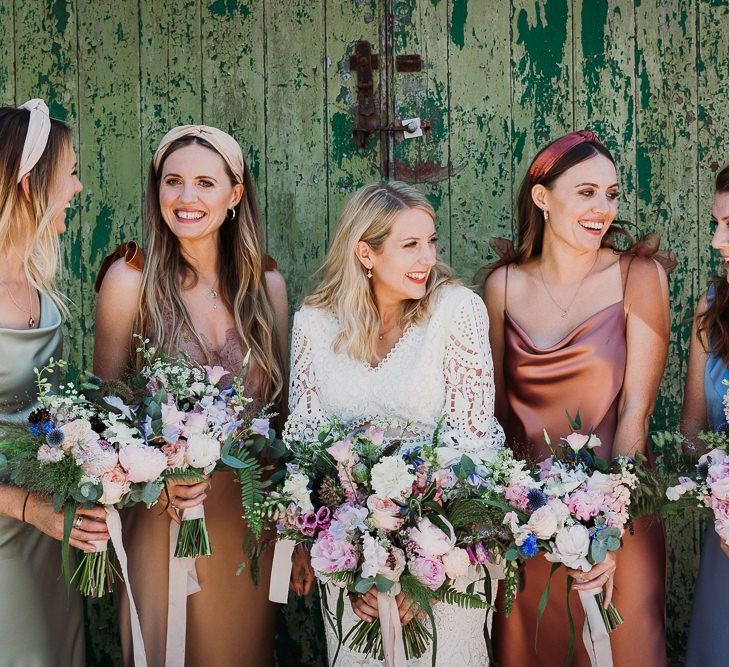 Bride and Bridesmaids in Mismatched Bridesmaid Dresses