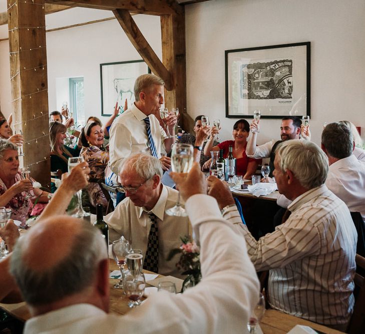 Guests During Speeches Raising A Toast