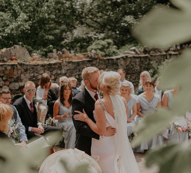 Bridal undo with embroidered veil