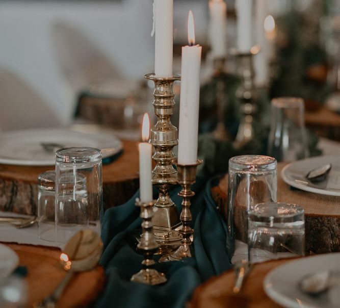 Wedding table decor with candles and gold candle sticks