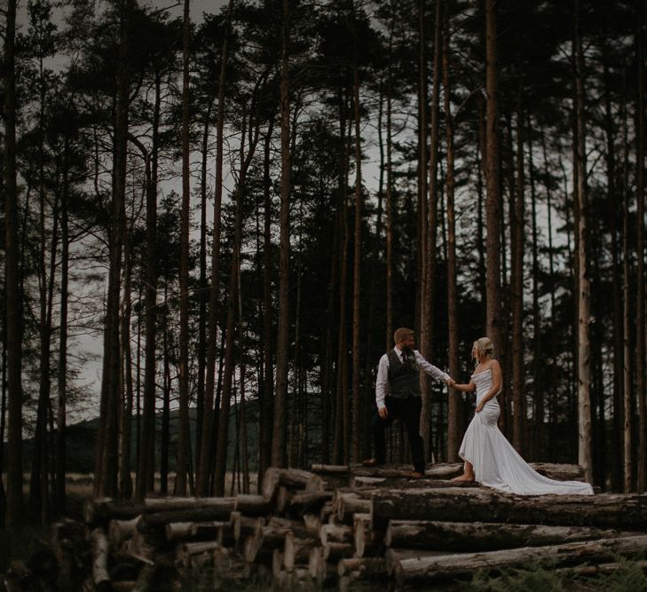 Bride and groom in the grounds of the wedding venue in Cumbria