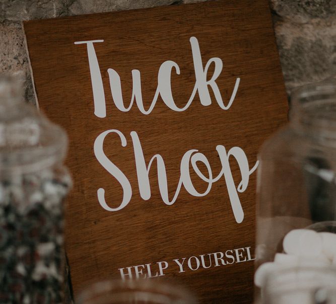 Wooden wedding sign for tuck shop and retro sweet table