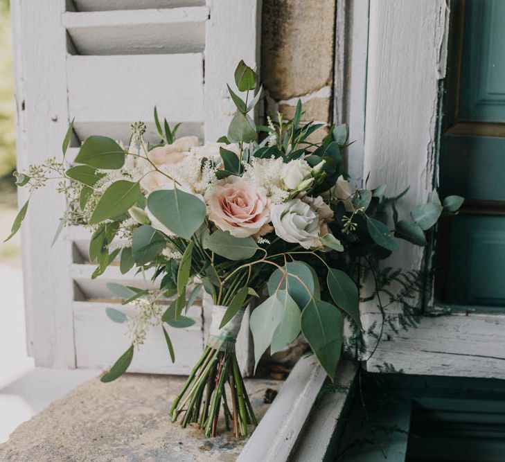 Bridal Bouquet of Blush and White Flowers with Foliage | Outdoor Seating Area and Macaroon Tower at French Chateau Wedding | Lush Imaging