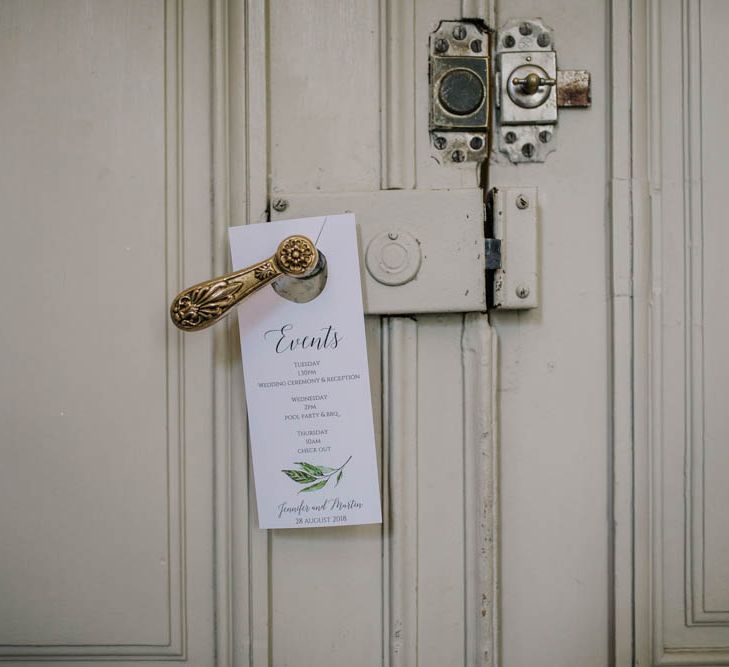 Order of Events Door Sign | Outdoor Seating Area and Macaroon Tower at French Chateau Wedding | Lush Imaging