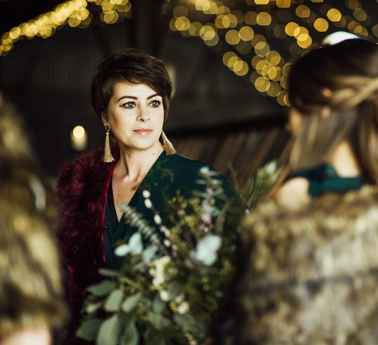 Bridesmaids in Forest Green Outfits with Metallic Gold Accessories