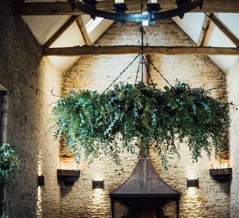 Hanging Foliage Chandelier at Stone Barn Wedding Venue in the Cotswolds