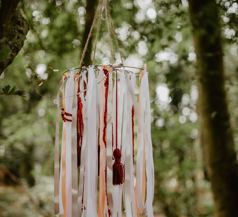 DIY Ribbon Chandelier Wedding Decor | Macramé &amp; Dreamcatcher Woodland Wedding at Upthorpe Wood | Camilla Andrea Photography