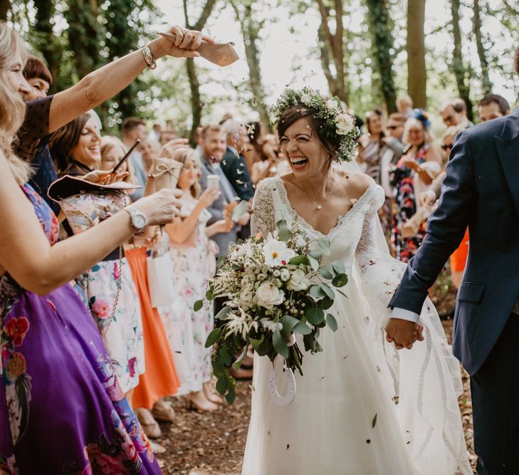 Outdoor Humanist Wedding Ceremony | Boho Bride in Flower Crown &amp; Kula Tsurdui  Wedding Dress | Groom in Navy Blue Suit  | Macramé &amp; Dreamcatcher Woodland Wedding at Upthorpe Wood | Camilla Andrea Photography