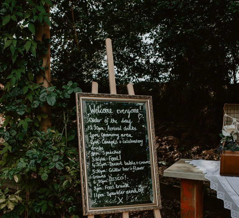 Mirror Welcome Sign on an Easel | Wedding Decor | Macramé &amp; Dreamcatcher Woodland Wedding at Upthorpe Wood | Camilla Andrea Photography