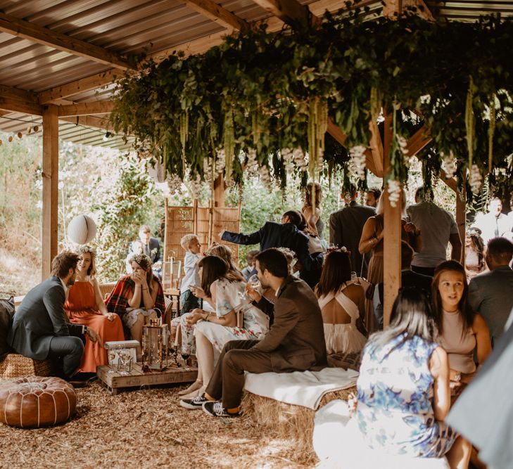 Rustic Seating Area | Macramé &amp; Dreamcatcher Woodland Wedding at Upthorpe Wood | Camilla Andrea Photography