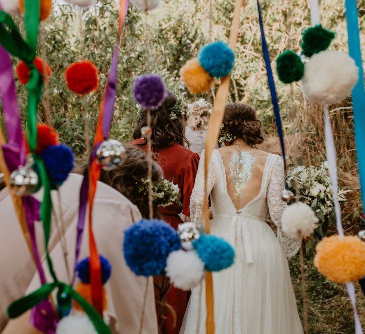 Pompom Wedding Decor | Boho Bride in Flower Crown &amp; Kula Tsurdui  Wedding Dress | Macramé &amp; Dreamcatcher Woodland Wedding at Upthorpe Wood | Camilla Andrea Photography