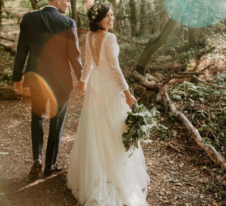 Boho Bride in Flower Crown &amp; Kula Tsurdui  Wedding Dress | Groom in Navy Blue Suit  | Macramé &amp; Dreamcatcher Woodland Wedding at Upthorpe Wood | Camilla Andrea Photography