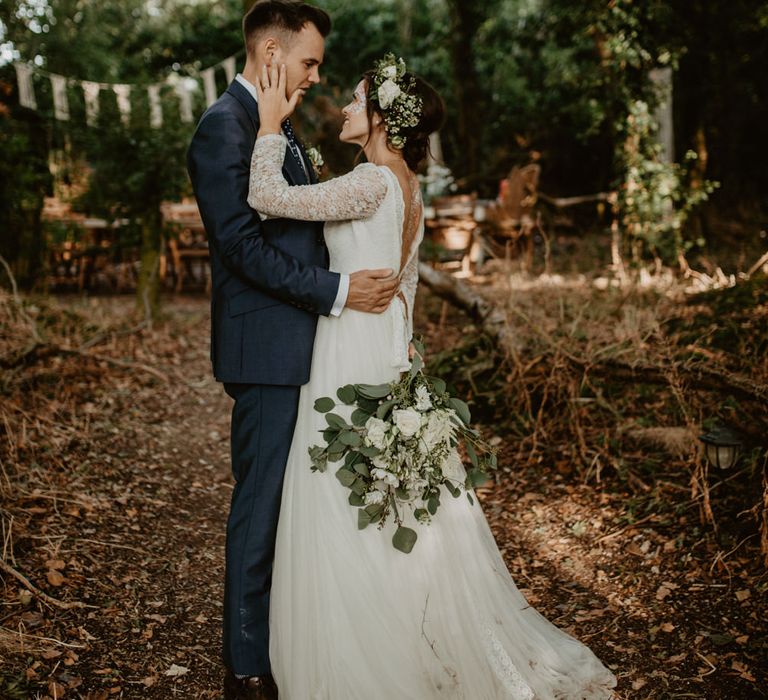 Boho Bride in Flower Crown &amp; Kula Tsurdui  Wedding Dress | Groom in Navy Blue Suit  | Macramé &amp; Dreamcatcher Woodland Wedding at Upthorpe Wood | Camilla Andrea Photography