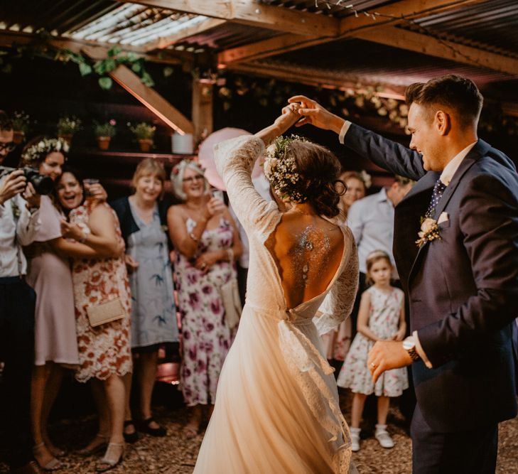 First Dance | Boho Bride in Flower Crown &amp; Kula Tsurdui  Wedding Dress | Groom in Navy Blue Suit  | Macramé &amp; Dreamcatcher Woodland Wedding at Upthorpe Wood | Camilla Andrea Photography