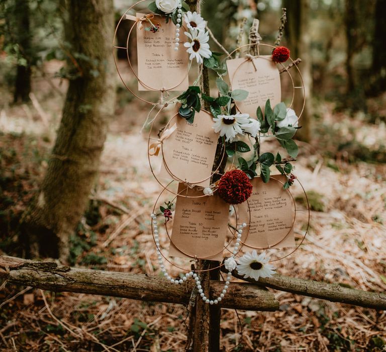 Hoop Seating Chart | Macramé &amp; Dreamcatcher Woodland Wedding at Upthorpe Wood | Camilla Andrea Photography