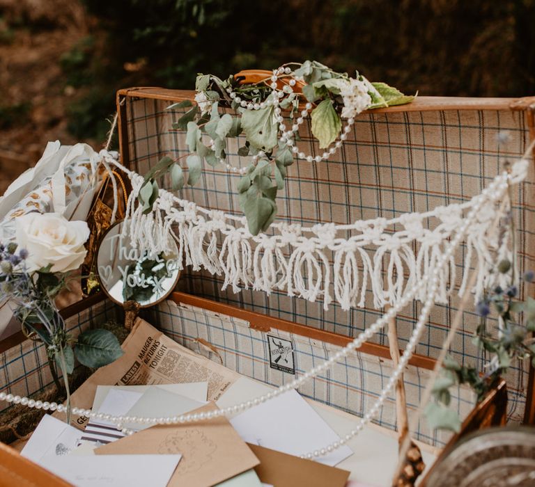 Vintage Suitcase Wedding Card Box with Macrame Bunting | Wedding Decor | Macramé &amp; Dreamcatcher Woodland Wedding at Upthorpe Wood | Camilla Andrea Photography