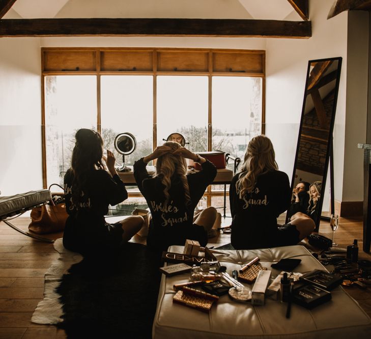 Bridesmaids Getting Ready on Wedding Morning in Brides Squad Getting Ready Robes