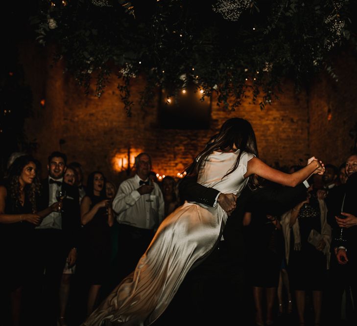 First Dance with Groom Picking His Bride Up