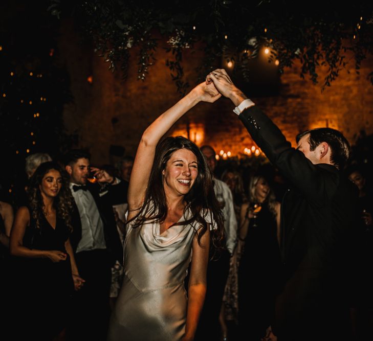 Bride in Slinky Second Dress for First Dance