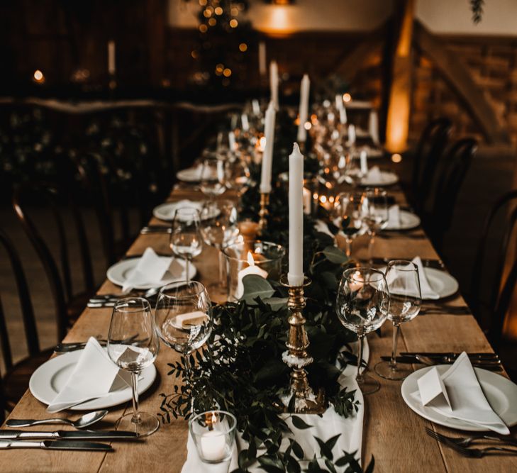 Elegant Tablescape with Greenery Table Runner and Candlestick Centrepieces