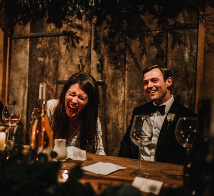 Bride Laughing During Wedding Reception Speeches