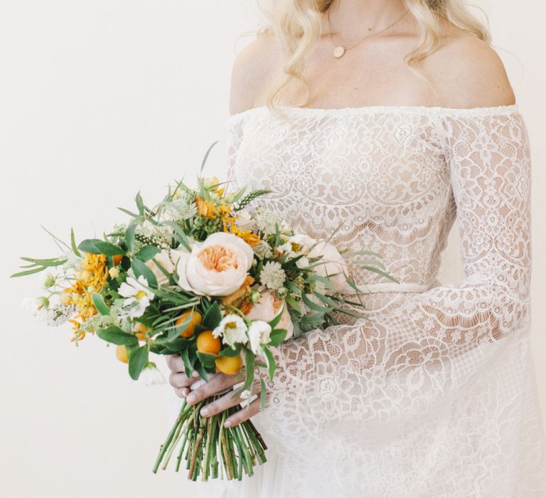 Bride in Bardot Buttons on Tulle and Lace Flora Bridal Wedding Dress