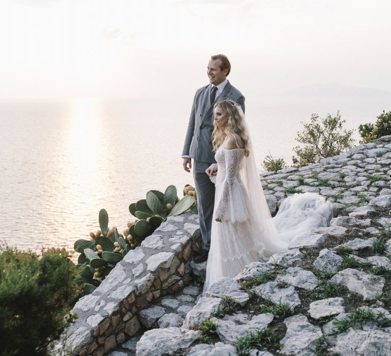 Boho Bride in Bardot Tulle and Lace Flora Bridal Wedding Dress and Groom in Grey Ralph Lauren Suit