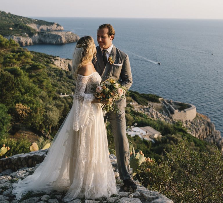 Boho Bride in Bardot Tulle and Lace Flora Bridal Wedding Dress and Groom in Grey Ralph Lauren Suit