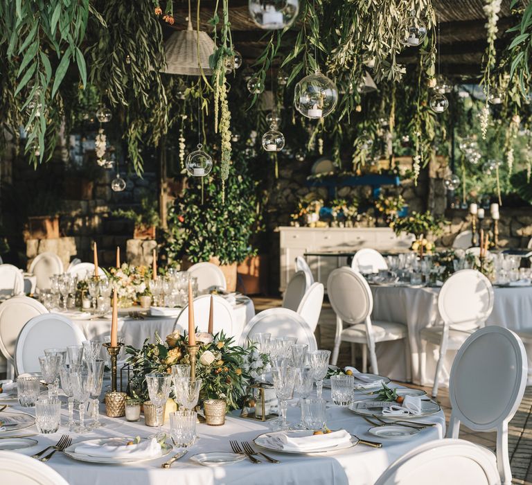 Outdoor Wedding Reception Decor with Peach Flowers and Foliage