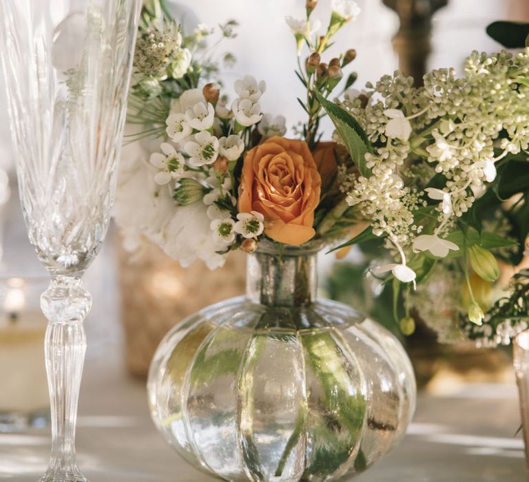 Single Flower Stems in Glass Vases