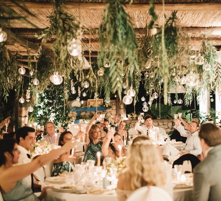 Hanging Foliage and Glass Votive Candles